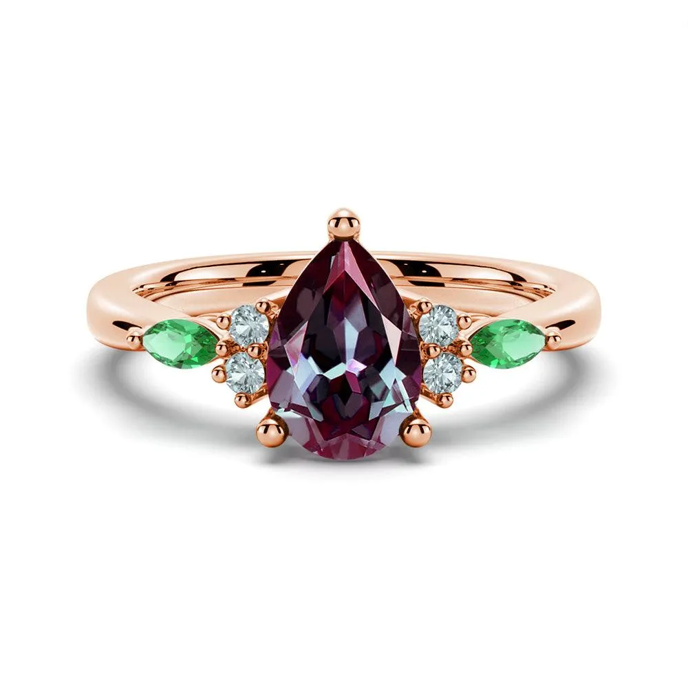 1.5 CT. Pear Shaped Alexandrite Engagement Ring With Emerald Accents Glow Up Look