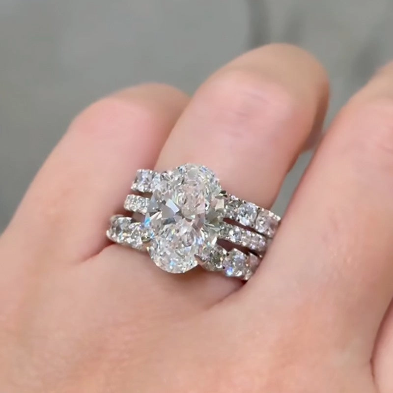 Trendy Piece Bold Details 3PC 6.0Ct Oval Cut Wedding Ring Set With Two Classic Round Cut Wedding Bands