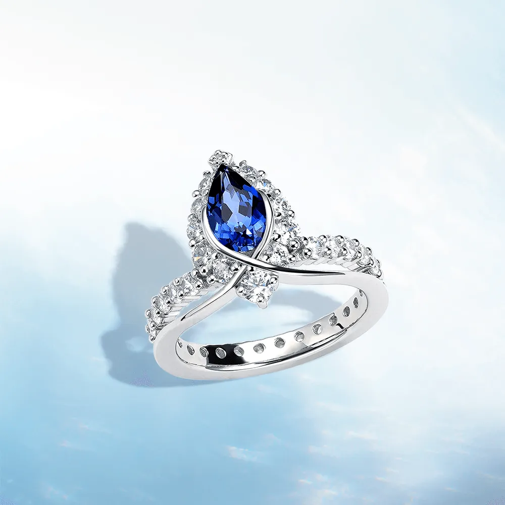 "ENDLESS BLUE" Luxe Crown Pear Shaped Sapphire Ring Timeless Features