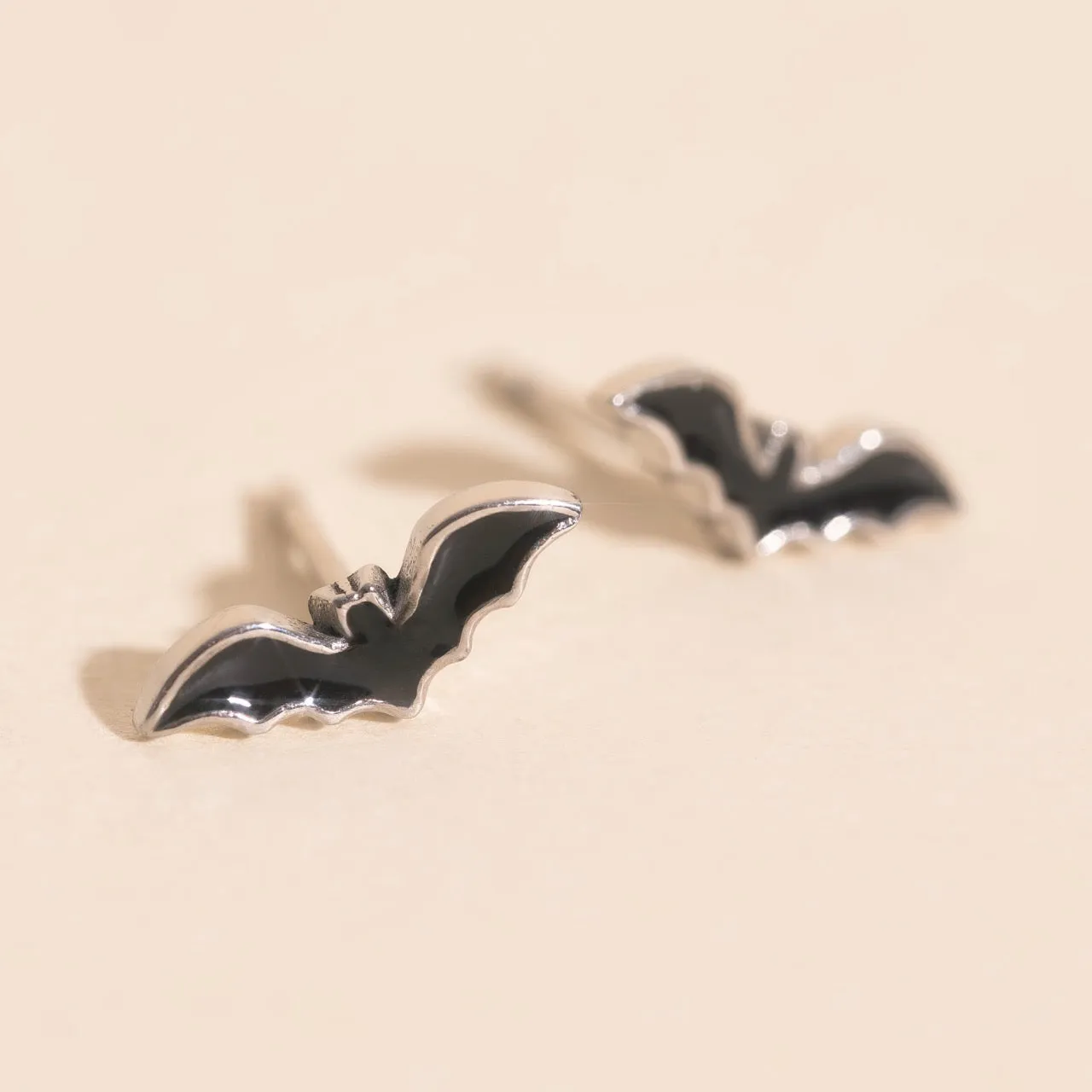 Curved Trinket Bat Stud Earrings