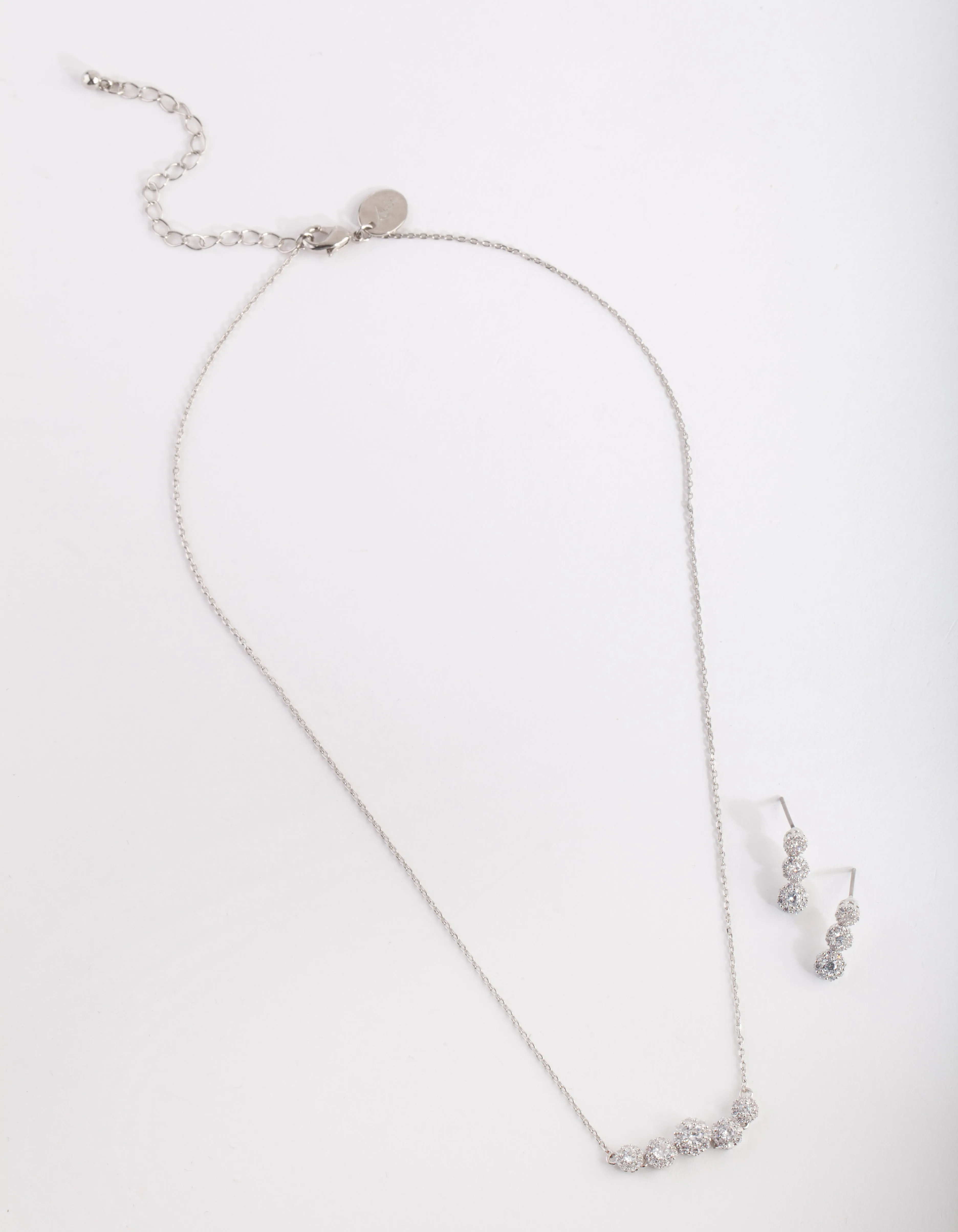 Unique Accessories Soft Detail Cubic Zirconia Flower Row Necklace Earrings Set