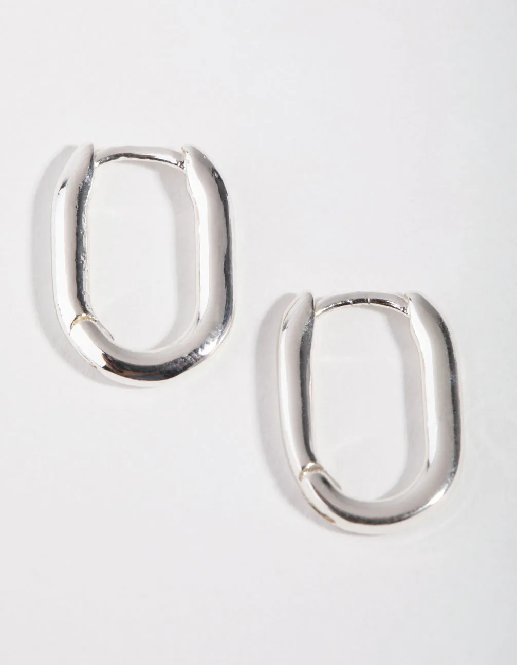 Distinct Piece Sterling Silver Sleek Oval Huggie Earrings
