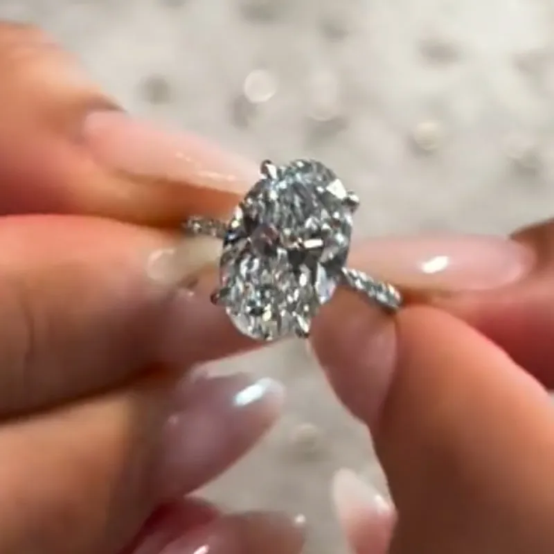 6.0Ct Oval Cut Hidden Halo Engagement Ring In Sterling Silver Shiny Texture