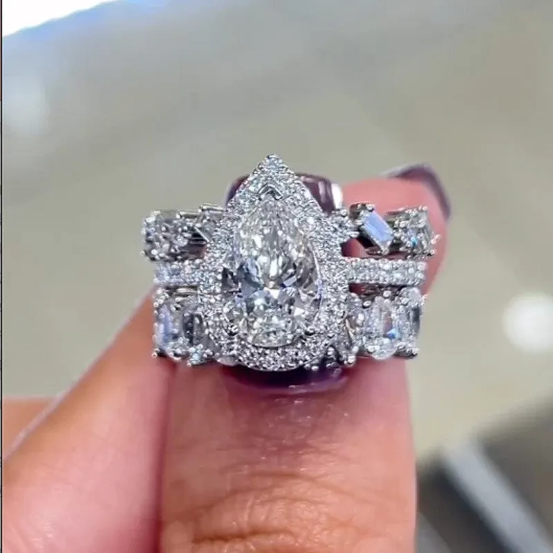 Modern Style 2.2 Carat Halo Pear Cut Wedding Ring Set With Two Luxurious Wedding Bands