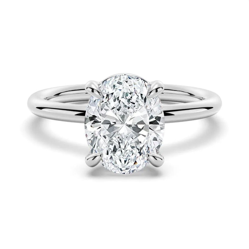 Modern Work Four Prongs Oval Solitaire Moissanite Engagement Ring