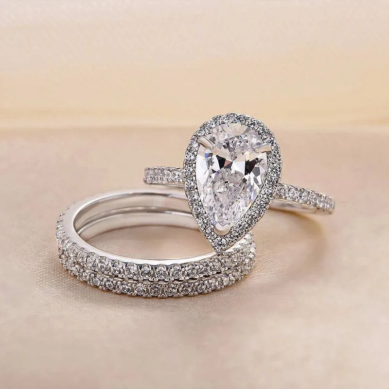 Fashionable Sparkle Luxury Spark Louily Exquisite Halo Pear Cut 3PC Wedding Ring Set In Sterling Silver