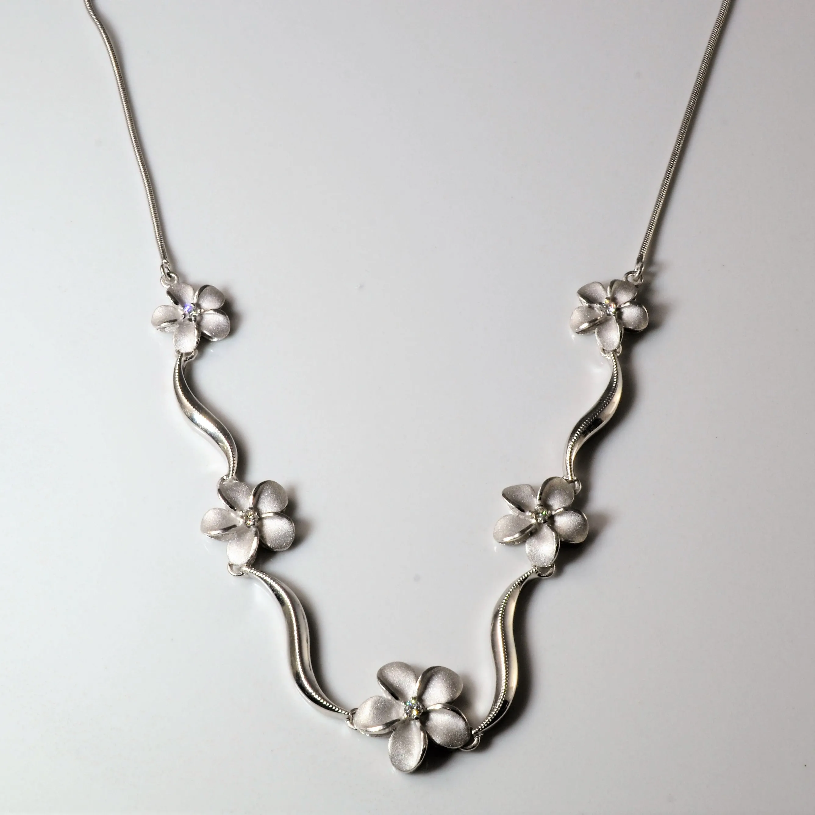 Soft Focus White Gold Diamond Plumeria Necklace | 0.10ctw | 18" |