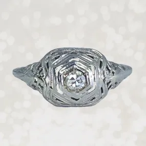 Polished Harmony 1920s Art Deco Diamond Engagement Ring in a 18K White Gold Filigree Setting. Estate Jewelry.