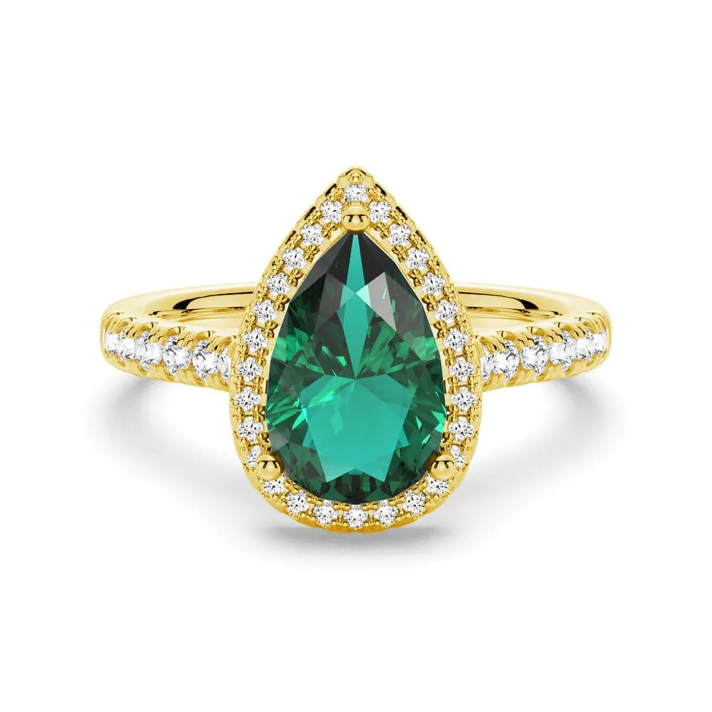 1.5 CT. Pear Shaped Emerald Ring with White Sapphire Halo Accents Luxe For Less Creative Twist