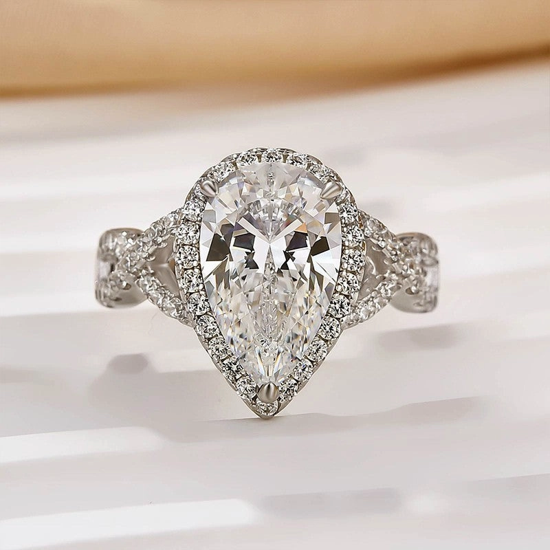 4.0Ct Halo Pear Cut Twist Travel Ring In Sterling Silver Glamour Accessory Finest Form