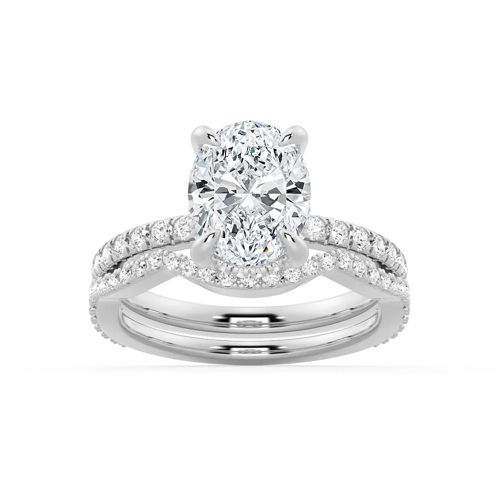 Timeless Form Refined Finish Micropav?? Oval Moissanite Ring Set with Matching Wedding Band