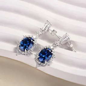 Crisp Edge Glowing Accent Vintage Halo Oval Cut Blue Sapphire Women's Earrings In Sterling Silver